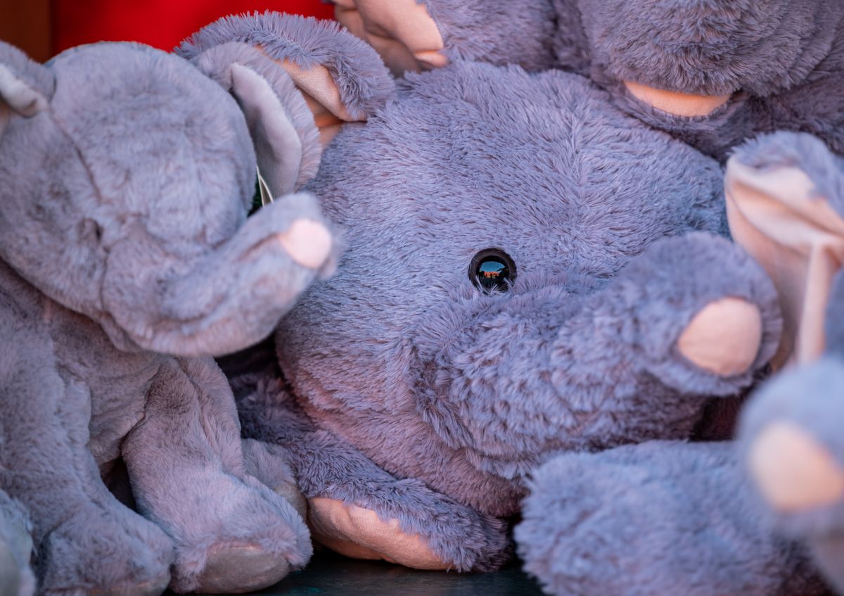 A close-up of soft plush toys